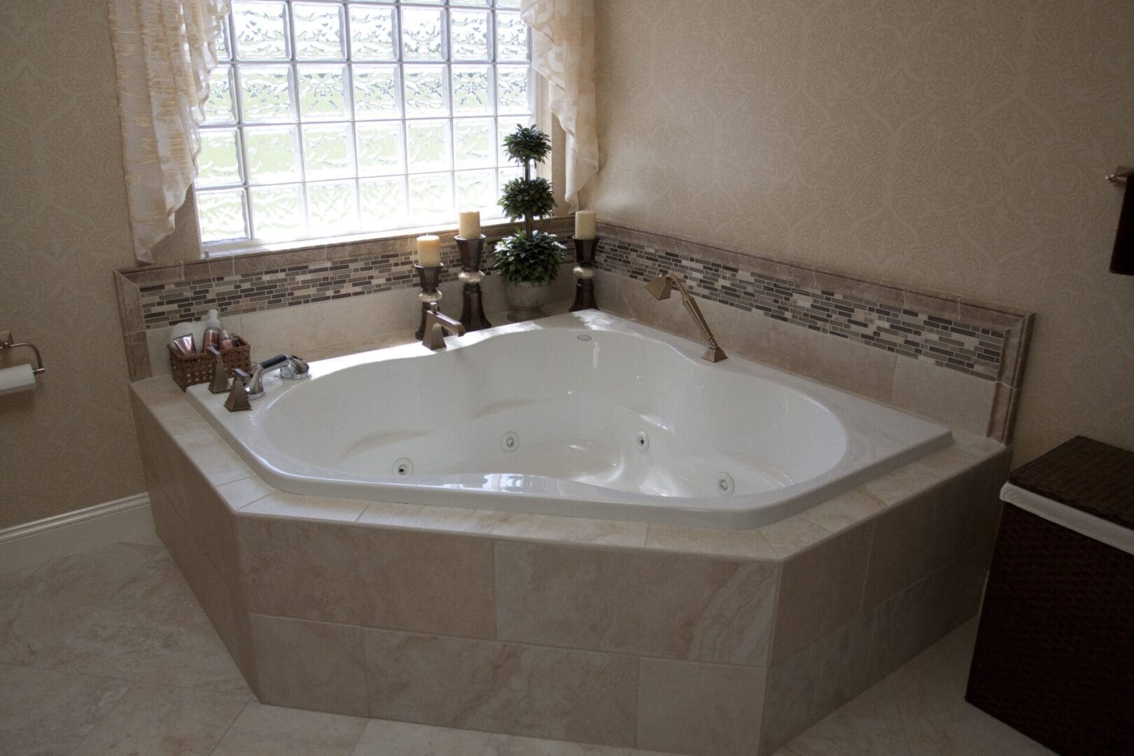 A large white tub sitting in the middle of a bathroom.
